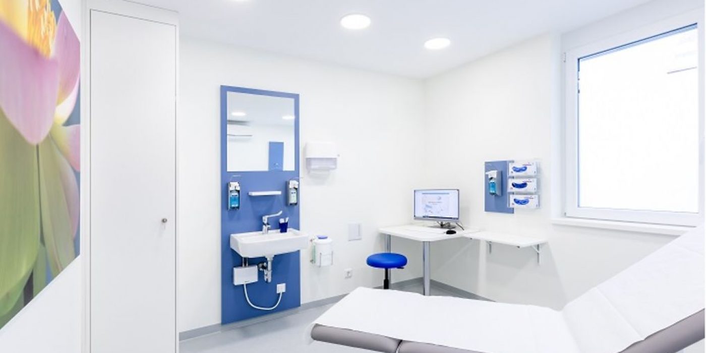 Modern examination room with medical workstation
